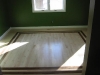 maple_floor_with_walnut_boarder_and_flush_mount_vents_traffic_water_base_finish